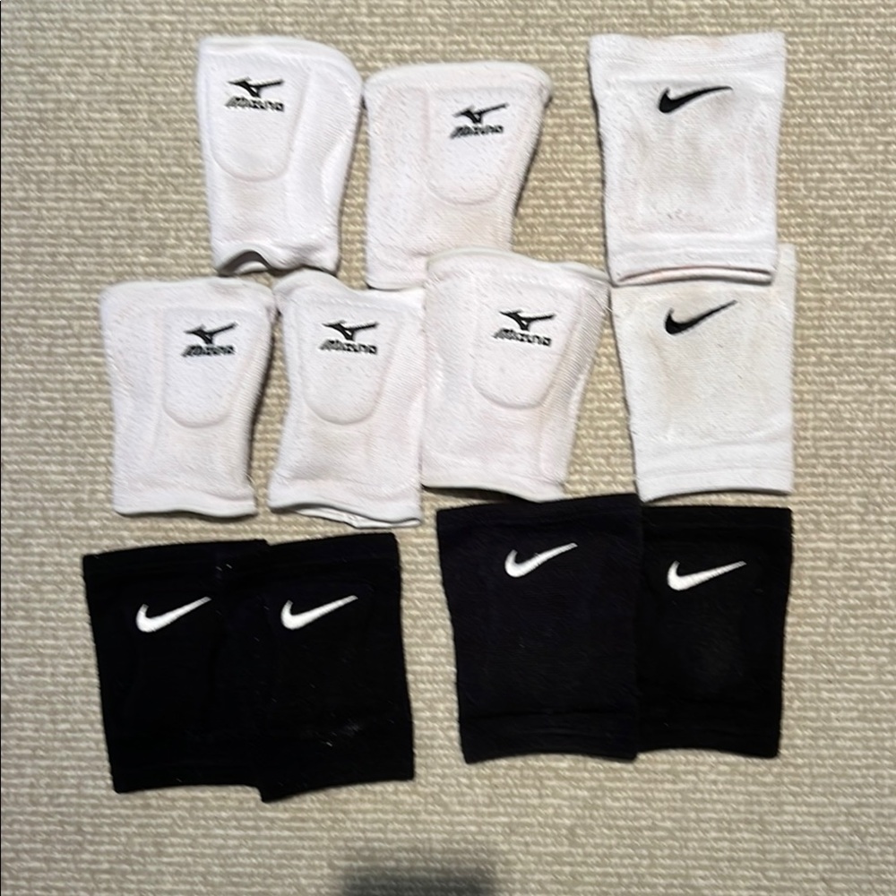 Nike and Mizuno White and Black Knee Pads